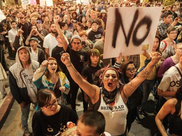 Demonstrators gather to protest a day after president-elect Donald Trump's victory, at a rally outside Los Angeles City Hall in Los Angeles. (AFP) Demonstrators gather to protest a day after president-elect Donald Trump's victory, at a rally outside Los Angeles City Hall in Los Angeles. (AFP)