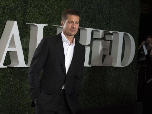 After months out of the spotlight following his separation from Angelina Jolie, actor Brad Pitt made a return at a premiere of his new film Allied, co-starring Marion Cotillard. (AFP)