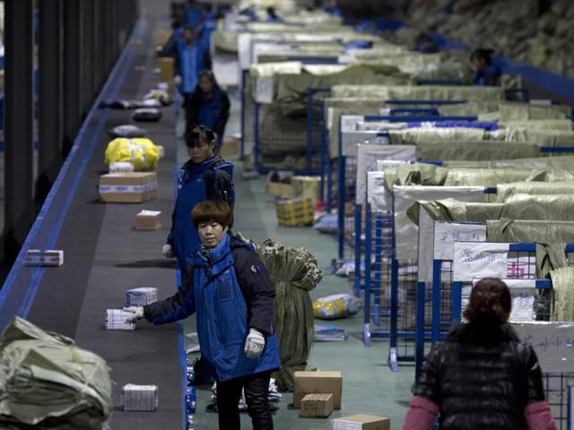 Analysts expect $20bn in sales, smashing 2015’s record haul of $14.4bn, in a day that has eclipsed both Black Friday and Cyber Monday, the two biggest shopping days in the US. Workers at the ZTO Express logistic delivery centre process packages one day before China's Singles Day, traditionally the busiest day for online shopping in Beijing, China. (AP Photo) Analysts expect $20bn in sales, smashing 2015’s record haul of $14.4bn, in a day that has eclipsed both Black Friday and Cyber Monday, the two biggest shopping days in the US. Workers at the ZTO Express logistic delivery centre process packages one day before China's Singles Day, traditionally the busiest day for online shopping in Beijing, China. (AP Photo)