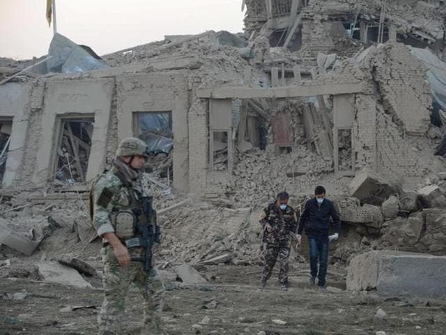 Afghan security forces and NATO troops investigate at the site of explosion near the German consulate office in Mazar-i-Sharif, Afghanistan. (Reuters) Afghan security forces and NATO troops investigate at the site of explosion near the German consulate office in Mazar-i-Sharif, Afghanistan. (Reuters)