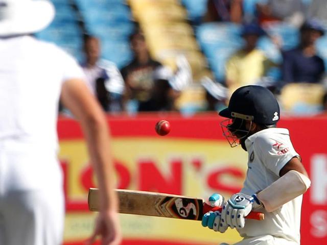 Cheteshwar Pujara withstood a hostile spell from Chris Woakes. He was hit on the helmet three times. (BCCI) 