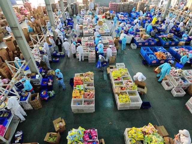 Employees work extra hours to pack products at a factory during the 11.11 shopping festival symbolizing the rise of the events main source: Chinese consumption. Alibaba says, sales volume is only one metric by which it judges Singles Day, and that it is inevitable that the law of big numbers comes into play.” (REUTERS Photo) Employees work extra hours to pack products at a factory during the 11.11 shopping festival symbolizing the rise of the events main source: Chinese consumption. Alibaba says, sales volume is only one metric by which it judges Singles Day, and that it is inevitable that the law of big numbers comes into play.” (REUTERS Photo)
