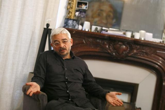 The owner of La Belle Equipe cafe, Gregory Reibenberg, answers questions during an interview with he Associated Press at his home in Paris, France. (AP Photo) The owner of La Belle Equipe cafe, Gregory Reibenberg, answers questions during an interview with he Associated Press at his home in Paris, France. (AP Photo)
