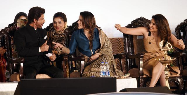 Shah Rukh Khan, Kajol and Parineeti Chopra share a light moment at the inauguration of the 22nd Kolkata International Film Festival on Friday. (Ashok Nath Dey/HT Photo)
