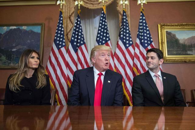 US President-elect Donald Trump speaks to the press with his wife Melania and House Speaker Paul Ryan at the US Capitol in Washington, DC, on November 10, 2016. (AFP Photo)