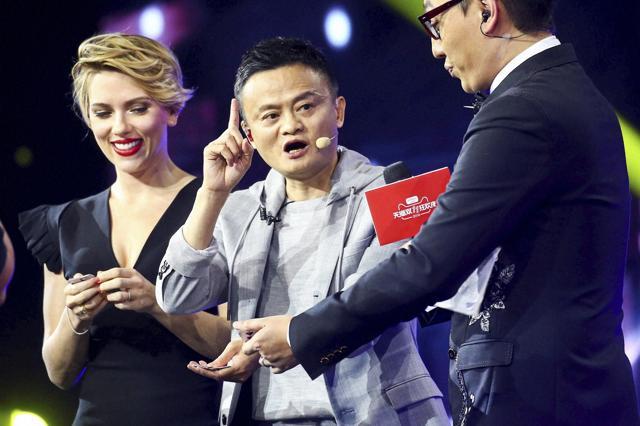 Hollywood actress Scarlett Johansson, left, and Alibaba Group Chairman Jack Ma attend an evening gala on the eve of the Singles Day online shopping festival in Shenzhen in southern China's Guangdong province. (AP Photo) Hollywood actress Scarlett Johansson, left, and Alibaba Group Chairman Jack Ma attend an evening gala on the eve of the Singles Day online shopping festival in Shenzhen in southern China's Guangdong province. (AP Photo)