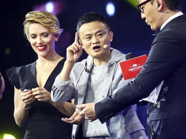Hollywood actress Scarlett Johansson, left, and Alibaba Group Chairman Jack Ma, center, at the gala on the eve of the Singles Day online shopping festival. The event this year also featured concerts by OneRepublic and appearances by Kobe Bryant, German soccer player Thomas Müller and other western celebrities. (AP Photo) Hollywood actress Scarlett Johansson, left, and Alibaba Group Chairman Jack Ma, center, at the gala on the eve of the Singles Day online shopping festival. The event this year also featured concerts by OneRepublic and appearances by Kobe Bryant, German soccer player Thomas Müller and other western celebrities. (AP Photo)
