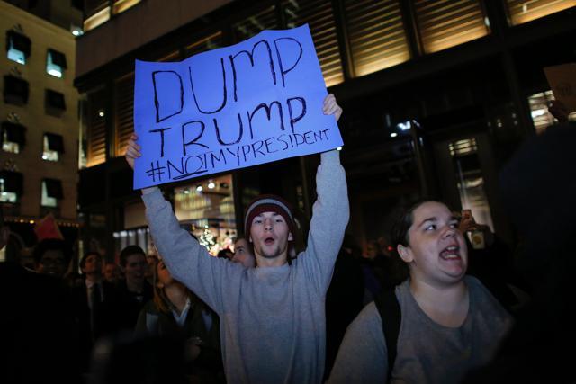 A young man shouts slogans as he takes part in a protest against President-elect Donald Trump in front of Trump Tower in New York on November 10. (AFP Photo) A young man shouts slogans as he takes part in a protest against President-elect Donald Trump in front of Trump Tower in New York on November 10. (AFP Photo)
