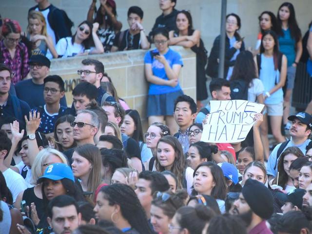 University of California Los Angeles students hold signs and listen to speeches before marching through campus during a "Love Trumps Hate" rally . (AFP Photo) University of California Los Angeles students hold signs and listen to speeches before marching through campus during a "Love Trumps Hate" rally . (AFP Photo)