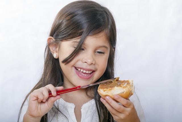 Peanut-containing foods should not be the first solid food your infant tries, and an introduction should be made only when your child is healthy. Do not do the first feeding if he or she has a cold, vomiting, diarrhea or other illness. (Shutterstock) Peanut-containing foods should not be the first solid food your infant tries, and an introduction should be made only when your child is healthy. Do not do the first feeding if he or she has a cold, vomiting, diarrhea or other illness. (Shutterstock)