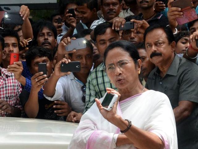 Mamata Banerjee listened to the woes of the customers, many of whom had lined up before the cash dispensers from early in the morning. Later she lashed out at the Centre calling it a ‘draconian decision’. (PTI File Photo) Mamata Banerjee listened to the woes of the customers, many of whom had lined up before the cash dispensers from early in the morning. Later she lashed out at the Centre calling it a ‘draconian decision’. (PTI File Photo)