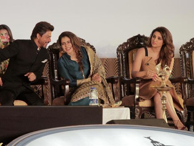 SRK and Kajol share a light moment as Parieeniti Chopra looks on. (AP Photo) SRK and Kajol share a light moment as Parieeniti Chopra looks on. (AP Photo)
