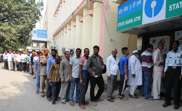 People wait outside an SBI ATM in Patna on Friday. (AP Dube/HT Photo) People wait outside an SBI ATM in Patna on Friday. (AP Dube/HT Photo)