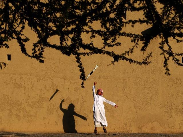 An Emirati child practices a traditional dance. Settlements have been reported in this region from as far back as the 3rd millennium BC. (AFP) An Emirati child practices a traditional dance. Settlements have been reported in this region from as far back as the 3rd millennium BC. (AFP)