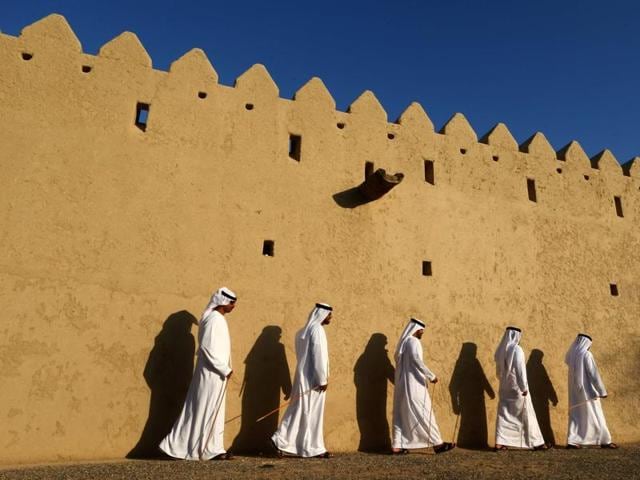 Emiratis walk past the fort during the festival. Today, Abu Dhabi offers an action-packed calendar which includes Grand Prix, the World Cup of Sailing, a PGA golf championship, international art, music, sport, gourmet, heritage and cultural festivals. (AFP) Emiratis walk past the fort during the festival. Today, Abu Dhabi offers an action-packed calendar which includes Grand Prix, the World Cup of Sailing, a PGA golf championship, international art, music, sport, gourmet, heritage and cultural festivals. (AFP)