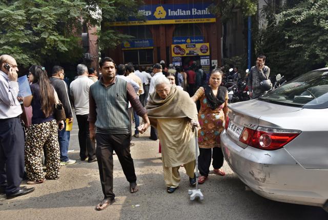 A senior citizen coming out after depositing the old currency at Indian Bank, Shanti Niketan branch in New Delhi. (Sanjeev Verma/HT Photo) A senior citizen coming out after depositing the old currency at Indian Bank, Shanti Niketan branch in New Delhi. (Sanjeev Verma/HT Photo)