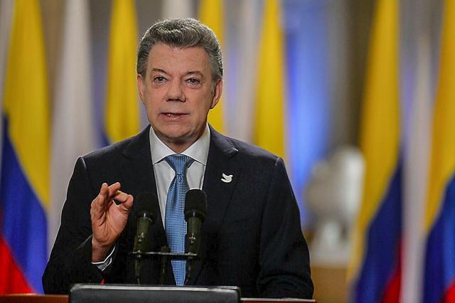 Colombian President Juan Manuel Santos at Narino Palace in Bogota on Saturday announcing the signing of the new peace deal. (AFP) Colombian President Juan Manuel Santos at Narino Palace in Bogota on Saturday announcing the signing of the new peace deal. (AFP)