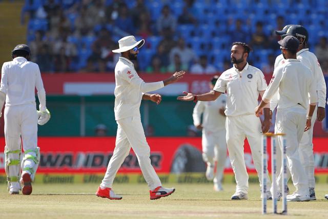 Amit Mishra picked up two wickets as England searched for quick runs on the final day of the Rajkot Test. (BCCI)