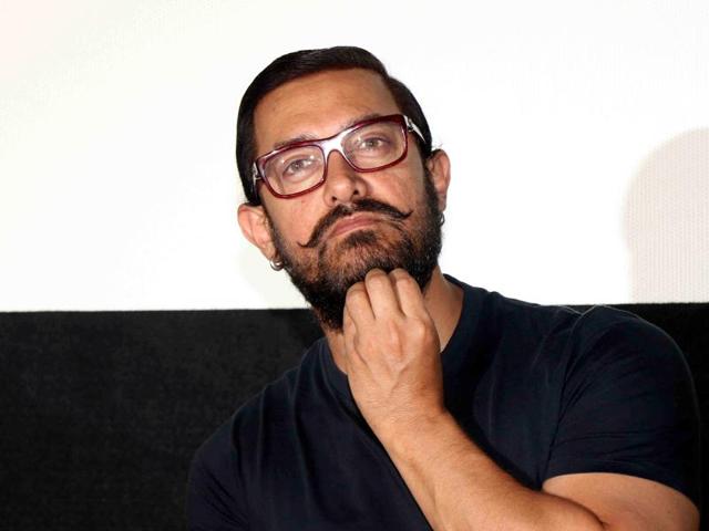Aamir Khan looks on during a promotional event for the forthcoming Hindi film Dangal in Mumbai. (AFP Photo)