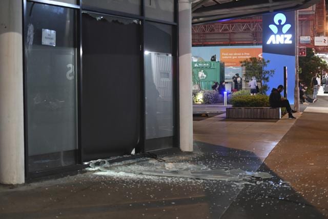 A broken window is seen in Tory Street after people were evacuated from the building in Wellington. (AP) A broken window is seen in Tory Street after people were evacuated from the building in Wellington. (AP)