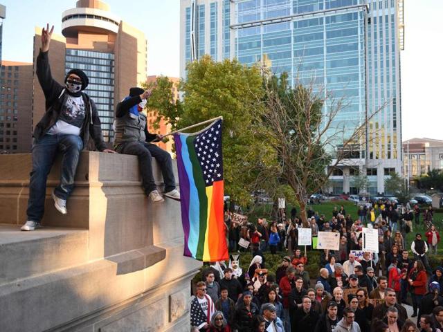 Protesters rally in Indianapolis, Indiana, against the election of Republican Donald Trump as president of the United States on Saturday (Reuters) Protesters rally in Indianapolis, Indiana, against the election of Republican Donald Trump as president of the United States on Saturday (Reuters)