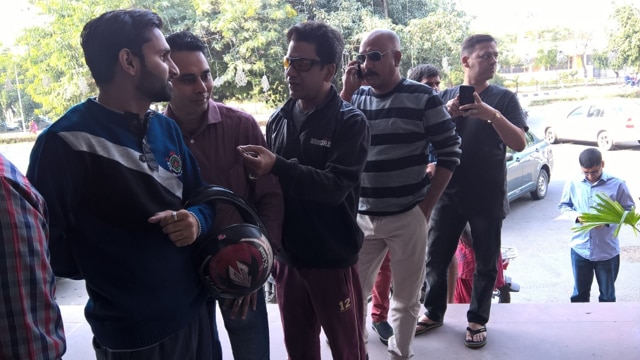 People waiting outside an ICICI ATM in Sector 11, Panchkula to withdraw cash on Monday. (HT Photo)