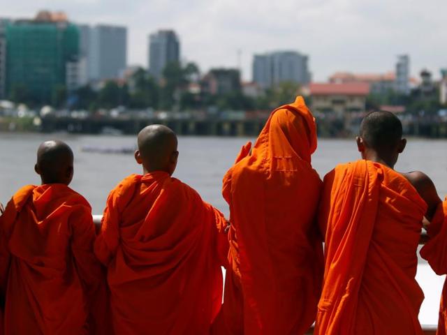 Buddhist monks at the start of a boat race near the Royal Palace during the annual Water Festival on the Tonle Sap river in Phnom Penh. (Reuters) Buddhist monks at the start of a boat race near the Royal Palace during the annual Water Festival on the Tonle Sap river in Phnom Penh. (Reuters)