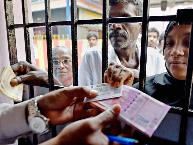 People exchange their old 500 and 1000 rupee notes at special camp organised by a public sector bank in Chennai on Saturday. (PTI) People exchange their old 500 and 1000 rupee notes at special camp organised by a public sector bank in Chennai on Saturday. (PTI)