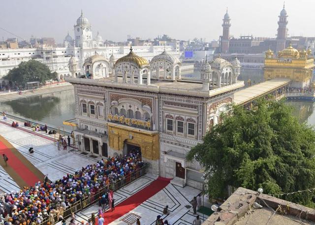 Rush of devotees at the Golden Temple on the birth anniversary of Guru Nanak Dev, in Amritsar on Monday. (Sameer Sehgal/HT Photo)