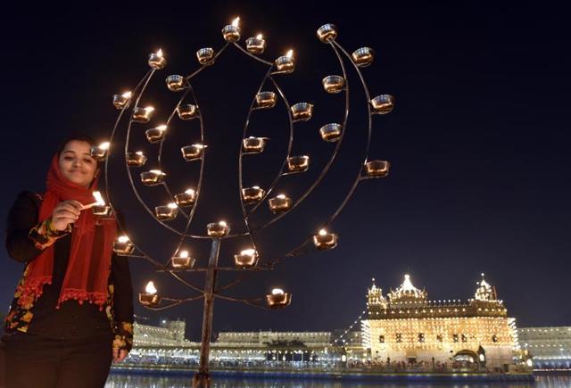 An illuminated Golden Temple on Guru Nanak Jayanti, in Amritsar on Monday. (Gurpreet Singh/HT Photo)