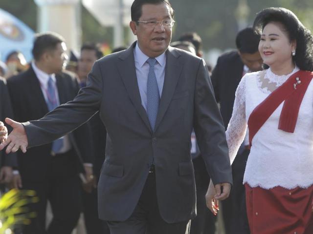 Cambodia's Prime Minister Hun Sen arrives with his wife Bun Rany for the Water Festival, organised in front of the Royal Palace in Phnom Penh, Cambodia on Sunday. (AP) Cambodia's Prime Minister Hun Sen arrives with his wife Bun Rany for the Water Festival, organised in front of the Royal Palace in Phnom Penh, Cambodia on Sunday. (AP)