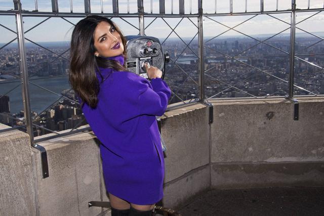 Priyanka Chopra, from the ABC series, Quantico, appears at the Empire State Building on Friday. (AP)