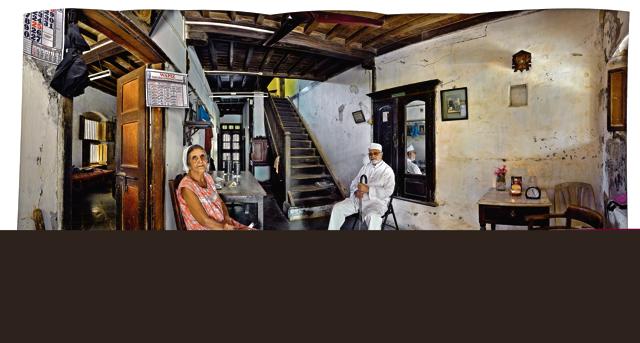 Old Parsi Home, Nargol, Gujarat. Manijha Parvez Panthaki, 78, enjoys the pleasure of a late morning visit by her older brother Barabsha N Govadia, 82, who has been a priest at the Parsi Agiary in Nargol, Gujarat for the last 26 years. the siblings are seated in the front room of Manijha’s house on Panthaki Street. Nargol is a coastal village near the town of Sanjan, where the Parsis first arrived on Indian shores in the seventh century. It has a large number of old, mostly empty, Parsi houses. (Amit Pasricha) Old Parsi Home, Nargol, Gujarat. Manijha Parvez Panthaki, 78, enjoys the pleasure of a late morning visit by her older brother Barabsha N Govadia, 82, who has been a priest at the Parsi Agiary in Nargol, Gujarat for the last 26 years. the siblings are seated in the front room of Manijha’s house on Panthaki Street. Nargol is a coastal village near the town of Sanjan, where the Parsis first arrived on Indian shores in the seventh century. It has a large number of old, mostly empty, Parsi houses. (Amit Pasricha)