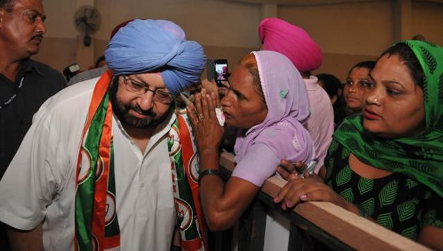 Punjab Congress president Capt Amarinder Singh listening to a participant during ‘Halke Vich Captain’ programme at Balachaur in Shaheed Bhagat Singh Nagar district in July. (HT File Photo) Punjab Congress president Capt Amarinder Singh listening to a participant during ‘Halke Vich Captain’ programme at Balachaur in Shaheed Bhagat Singh Nagar district in July. (HT File Photo)