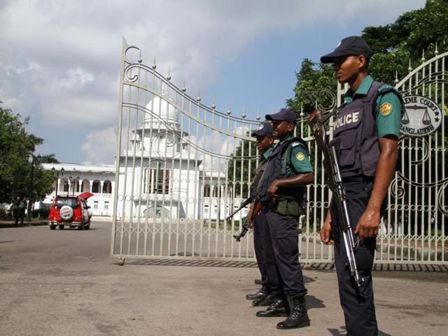 Bangladeshi police officials stand at an entrance to The Supreme Court in Dhaka. (AFP File Photo) Bangladeshi police officials stand at an entrance to The Supreme Court in Dhaka. (AFP File Photo)