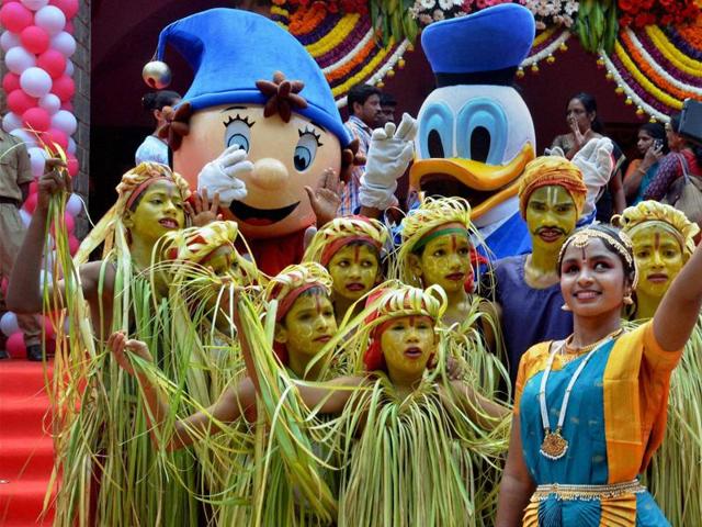 Children pose for a selfie during the children's day celebrations at Bengaluru on Monday. (PTI) Children pose for a selfie during the children's day celebrations at Bengaluru on Monday. (PTI)