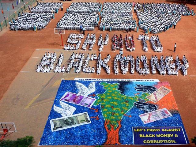 School children participate in an awareness campaign on ‘Fight against black money and corruption’ in Chennai on Monday. (PTI) School children participate in an awareness campaign on ‘Fight against black money and corruption’ in Chennai on Monday. (PTI)