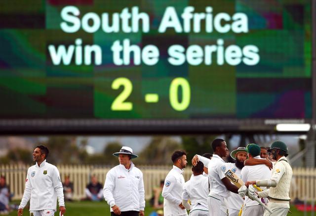Members of the South African team celebrate after defeating Australia. (REUTERS)