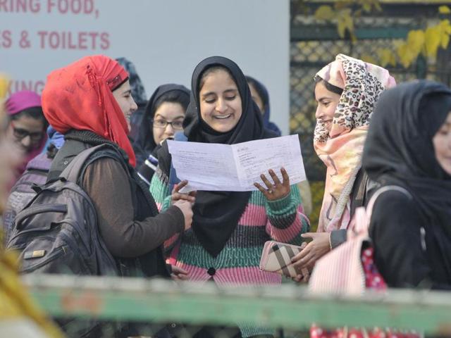Kashmiri students hug each other as they leave an examination center after taking higher secondary school exams in Srinagar.(Waseem Andrabi/HT Photo) Kashmiri students hug each other as they leave an examination center after taking higher secondary school exams in Srinagar.(Waseem Andrabi/HT Photo)
