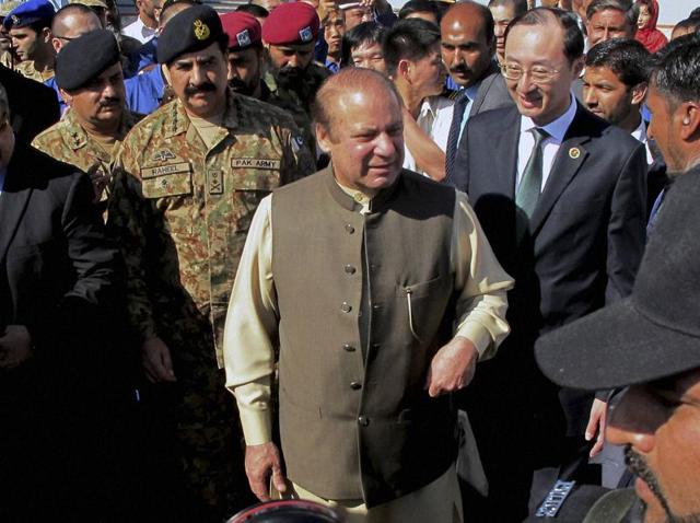 Pakistan's Prime Minister Nawaz Sharif, centre, army chief General Raheel Sharif, center left, and Chinese ambassador to Pakistan Sun Weidong, centre right, arrive for a ceremony at Gwadar port, about 700 kilometers (435 miles) west of Karachi. (AP) Pakistan's Prime Minister Nawaz Sharif, centre, army chief General Raheel Sharif, center left, and Chinese ambassador to Pakistan Sun Weidong, centre right, arrive for a ceremony at Gwadar port, about 700 kilometers (435 miles) west of Karachi. (AP)