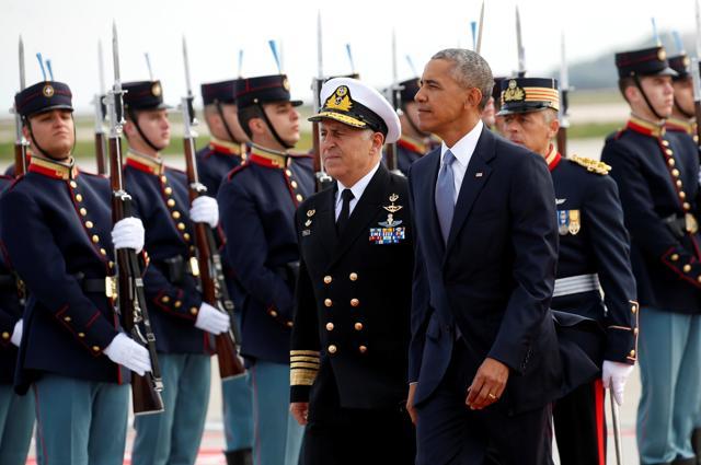US President Barack Obama reviews an honor guard upon his arrival in Athens, Greece on Tuesday. (Reuters) US President Barack Obama reviews an honor guard upon his arrival in Athens, Greece on Tuesday. (Reuters)