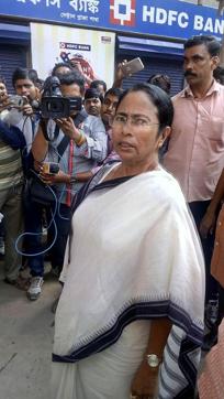 Mamata Banerjee wrote a poem in Bengali where she wrote the electorate will give the ‘ruler’ triple talaq in the impending elections. That evening the rising opposition culminated in a crescendo in a press conference where she lashed out at Modi for warning Indian’s of “strict action” from Japan and stepped up her rhetoric to the highest since the campaign began. (HT Photo) Mamata Banerjee wrote a poem in Bengali where she wrote the electorate will give the ‘ruler’ triple talaq in the impending elections. That evening the rising opposition culminated in a crescendo in a press conference where she lashed out at Modi for warning Indian’s of “strict action” from Japan and stepped up her rhetoric to the highest since the campaign began. (HT Photo)
