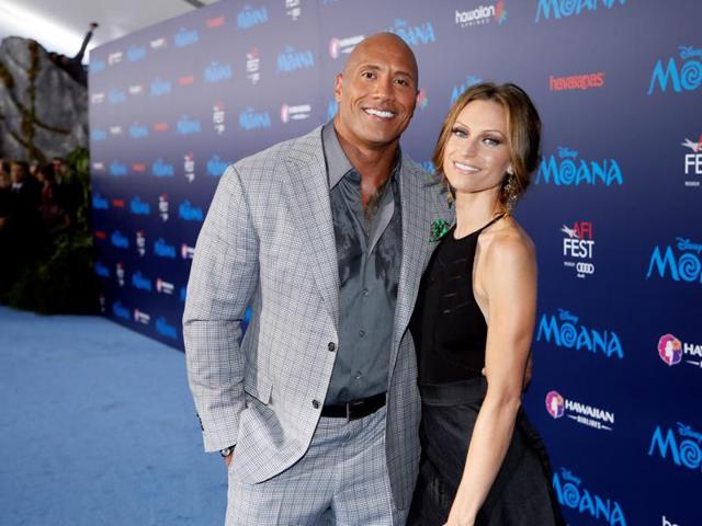 Actor Dwayne Johnson and his partner Lauren Hashian (R) pose at the world premiere of Walt Disney Animation Studios' Moana. Johnson plays Maui, the legendary demigod who sets off with Moana on her journey. (REUTERS) Actor Dwayne Johnson and his partner Lauren Hashian (R) pose at the world premiere of Walt Disney Animation Studios' Moana. Johnson plays Maui, the legendary demigod who sets off with Moana on her journey. (REUTERS)