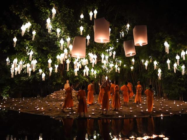Making lanterns and donating them to temples is considered a noble deed. The light of a lantern is represents the moving away from darkness into a brighter future and is therefore considered significant in the Buddhist culture. (AFP) 