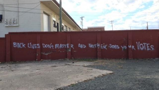 A Durham business owner said offensive graffiti was painted on a wall near the busy intersection of Main and Fayetteville streets. (Agencies Photo) A Durham business owner said offensive graffiti was painted on a wall near the busy intersection of Main and Fayetteville streets. (Agencies Photo)