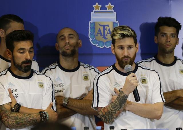 Standing in front of the entire Argentina squad at a post-match news conference following his team’s 3-0 win over Colombia, Lionel Messi said the players would no longer speak to press following the controversy. (AP) Standing in front of the entire Argentina squad at a post-match news conference following his team’s 3-0 win over Colombia, Lionel Messi said the players would no longer speak to press following the controversy. (AP)