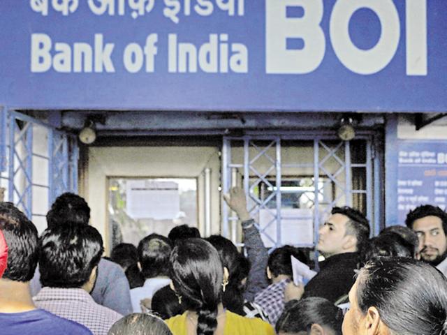 People waiting for a bank branch to open at Bank Square, Sector 17, in Chandigarh on Tuesday. (Ravi Kumar/HT Photo) People waiting for a bank branch to open at Bank Square, Sector 17, in Chandigarh on Tuesday. (Ravi Kumar/HT Photo)