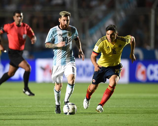 Lionel Messi kept Argentina in the hunt with a 3-0 win over Colombia in the World Cup qualifiers. (AFP)