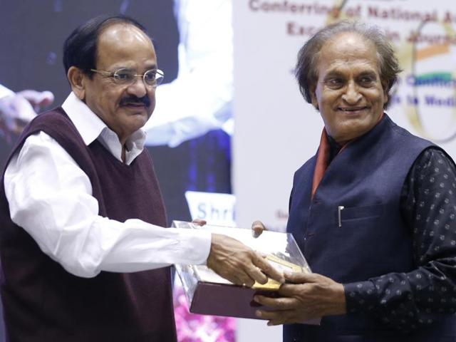 Renowned Indian photographer Raghu Rai, right, receives an award from Union Minister of Urban Development, Housing and Urban Poverty Alleviation and Information & Broadcasting, Venkaiah Naidu at the National Awards for Excellence in Journalism, in New Delhi. (AP Photo) Renowned Indian photographer Raghu Rai, right, receives an award from Union Minister of Urban Development, Housing and Urban Poverty Alleviation and Information & Broadcasting, Venkaiah Naidu at the National Awards for Excellence in Journalism, in New Delhi. (AP Photo)