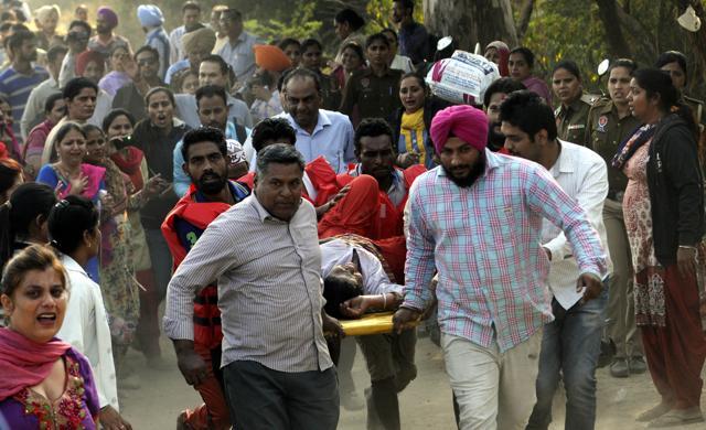 Karamjit being taken to hospital. Karamjit being taken to hospital.